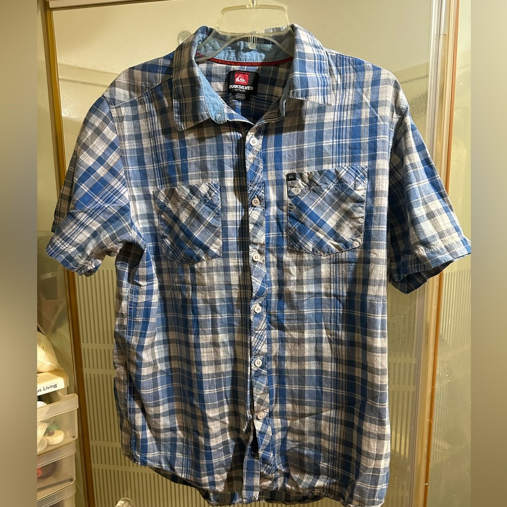 1 Quiksilver button up shirt.